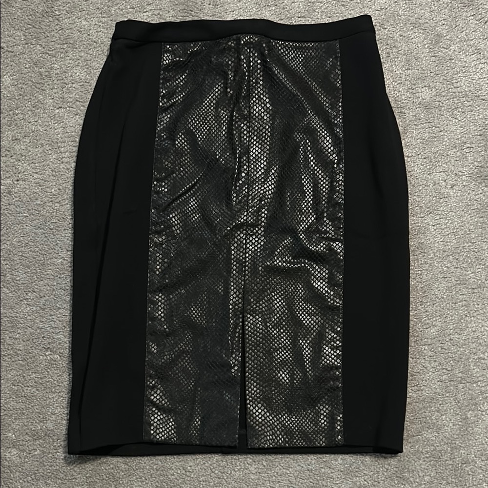Sleek Black Pencil Skirt with leather accents from Club Monaco. Size 2